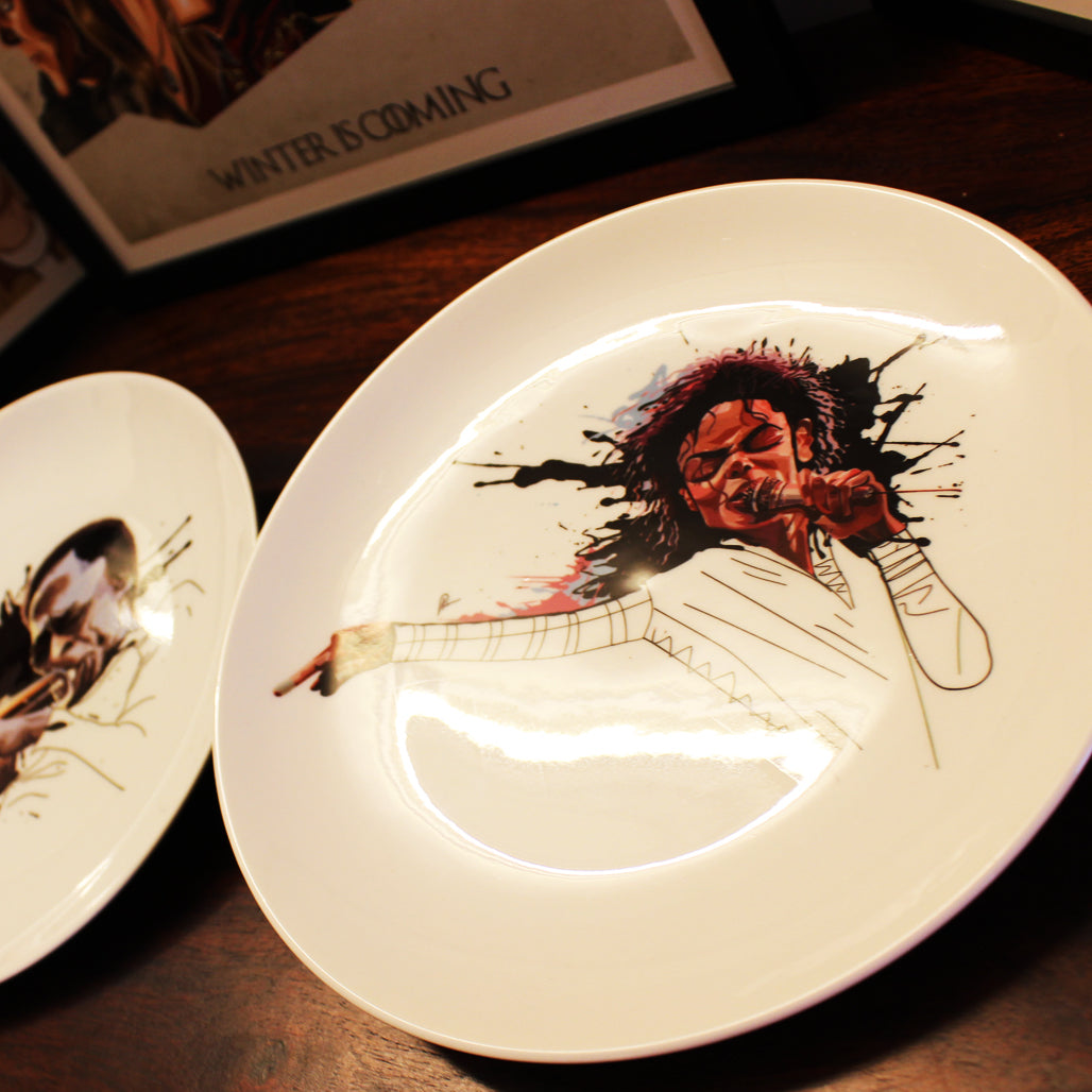 Michael Jackson Ceramic Decor Plate by artist Prasad Bhat decorated on a surface.