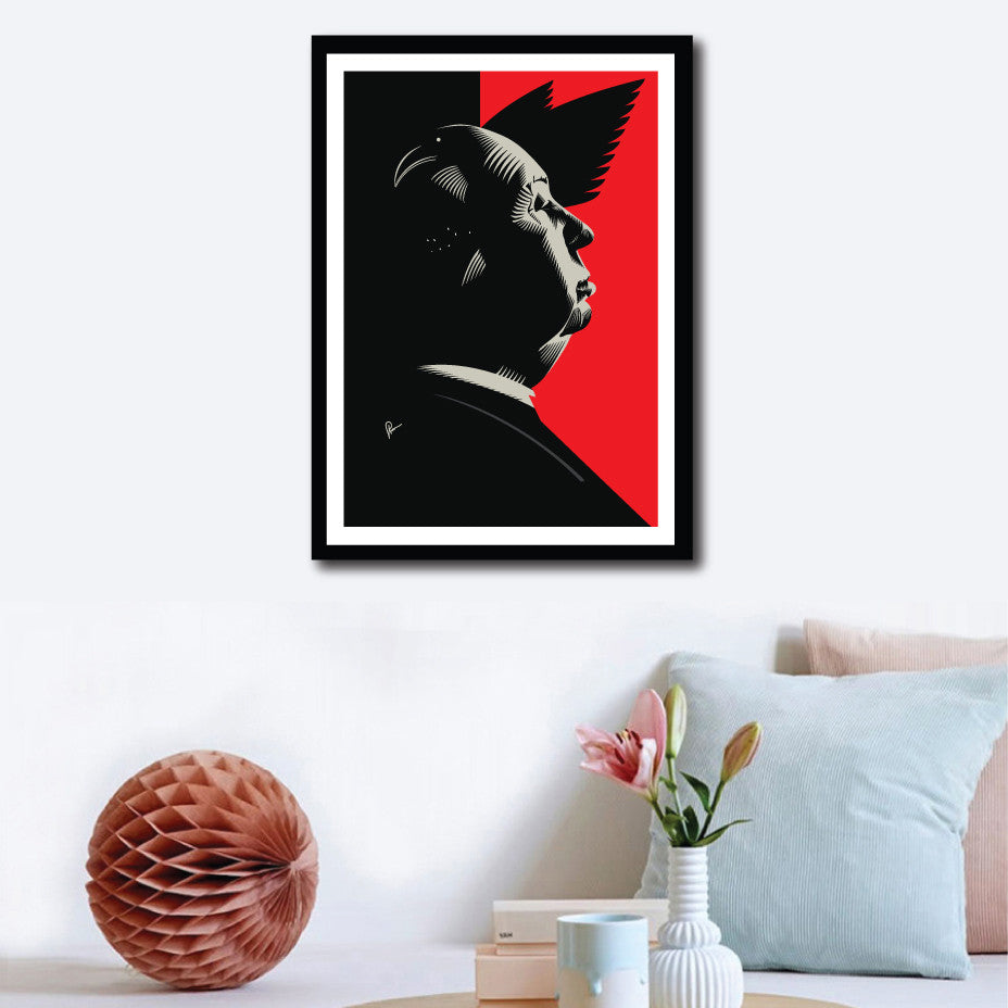 Framed Hitchcock Poster on a wall decor. This portrait is a artistic tribute by Prasad Bhat to his famous classic, Birds. If you look closely, you will see how! Image shows Hitchcock looking sideways with light falling on his face. Bird feathers are visible in the predominantly red and black background.